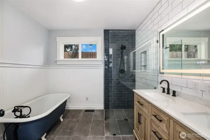Tile flooring and walk in shower.