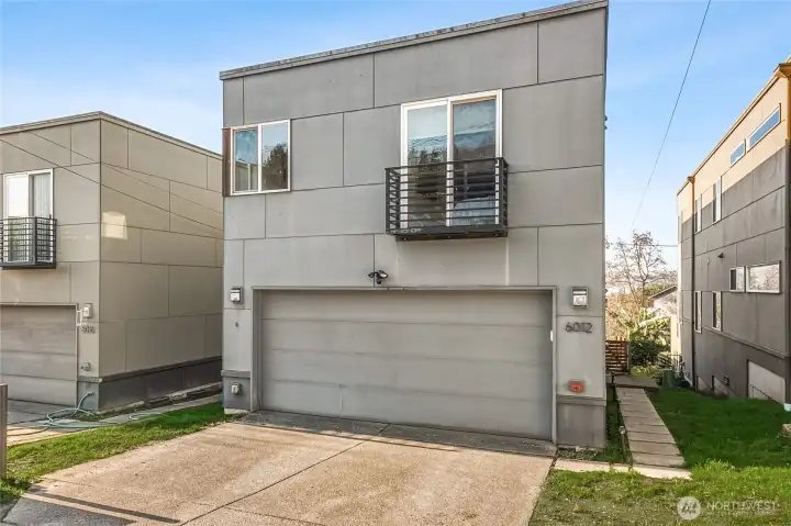 TWO CAR GARAGE off alley! Plus two more driveway parking spots.