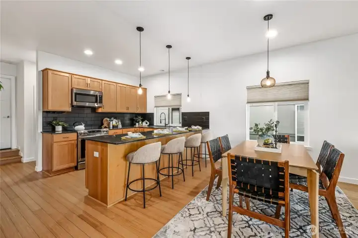 Enough room for a ten-person dining table, plus available space for even more occasional expansion (Thanksgiving, etc)