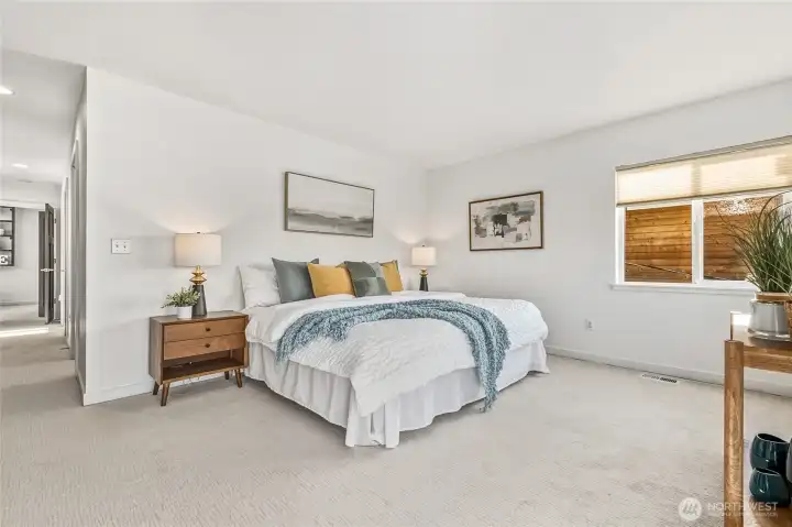 Primary suite is significantly sized.