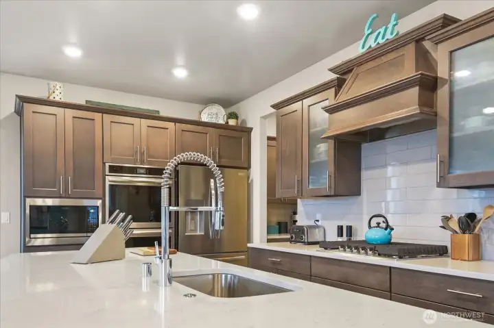 Gas range and hood vent.