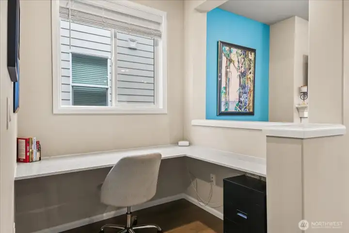 Built in desk between entry hall and the great room.