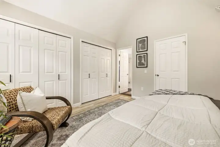 Generous primary suite with vaulted ceiling