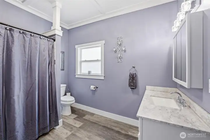 Nice large restroom next to primary bedroom.
