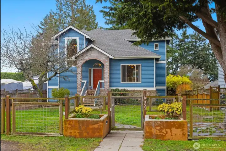 Charming curb appeal with welcoming front entry