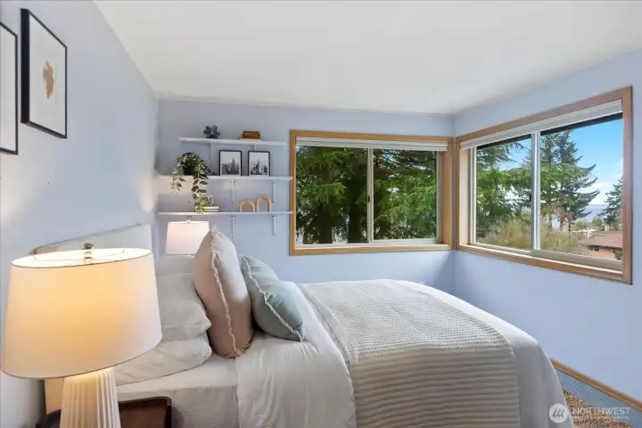 Light-filled 2nd bedroom with peaceful setting