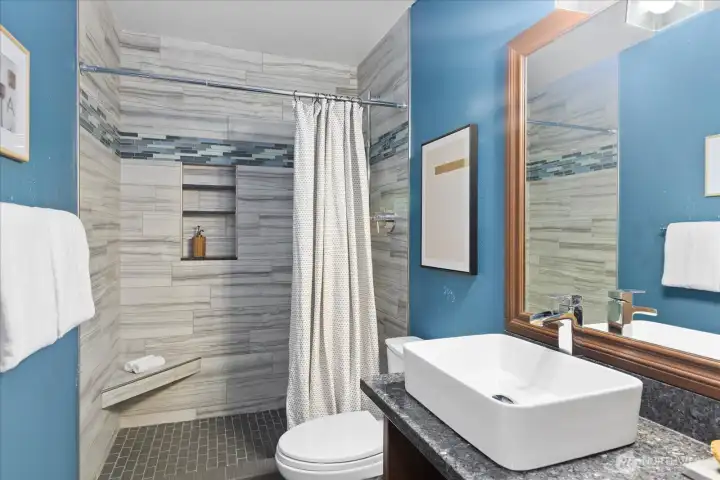 Additional bathroom with updated features in the basement