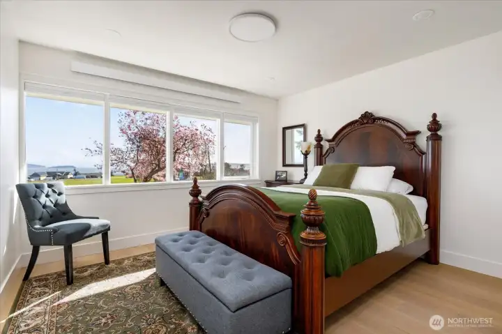 Main residence secondary bedroom with Sound views.