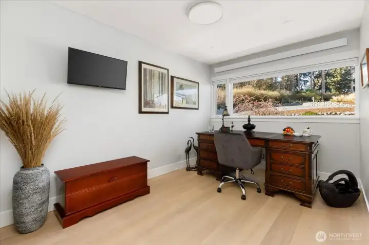 Primary residence third bedroom, office or flex space overlooks the rear patio.