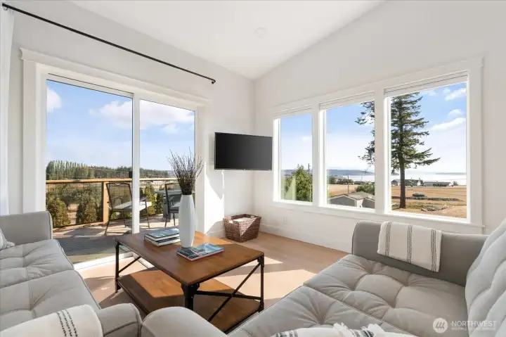 Guest Cottage living area with those brilliant Sound views!