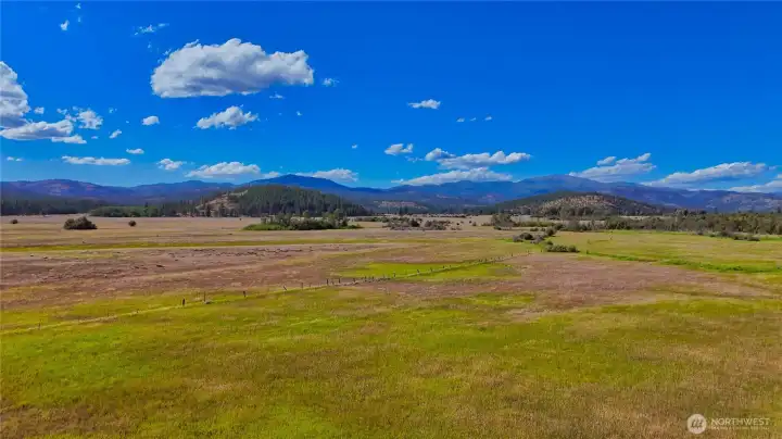 View of property to the West. Fence line can be seen separating property from the North owners and Northwest owners. View of property to the West. Fence line can be seen separating property from the North owners and Northwest owners.