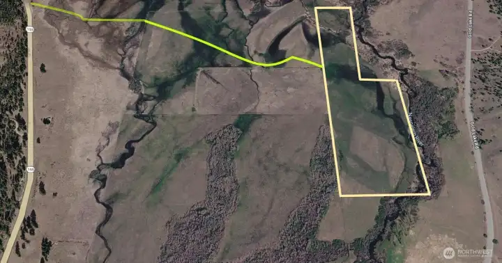 Aerial view with green line indicating drive thru fields access to 43.88 acres property. Aerial view with green line indicating drive thru fields access to 43.88 acres property.