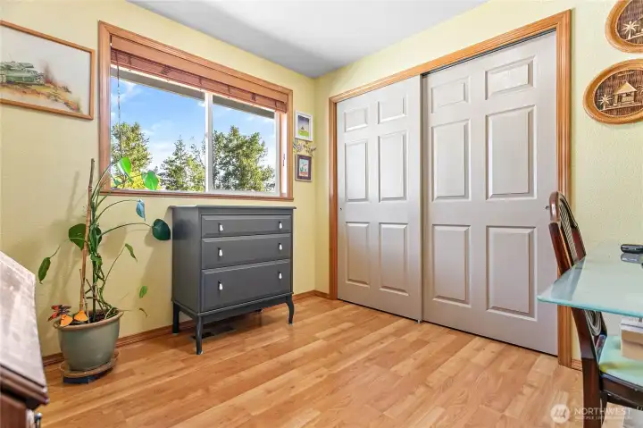 Bedroom or office located to the left of the foyer.