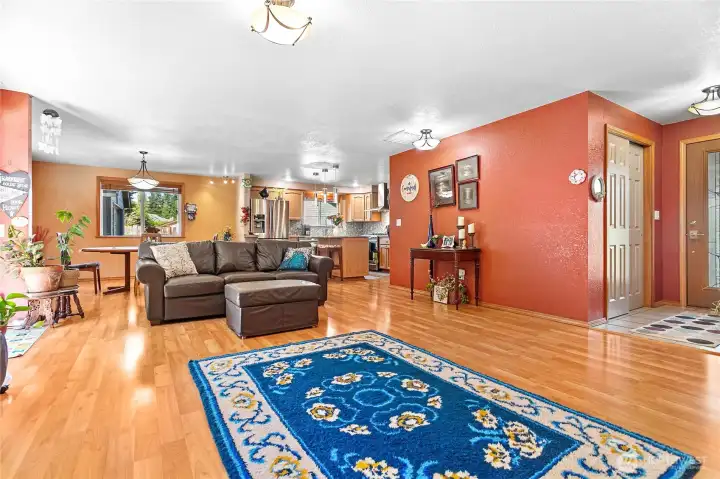 Open concept with living, dining, & kitchen