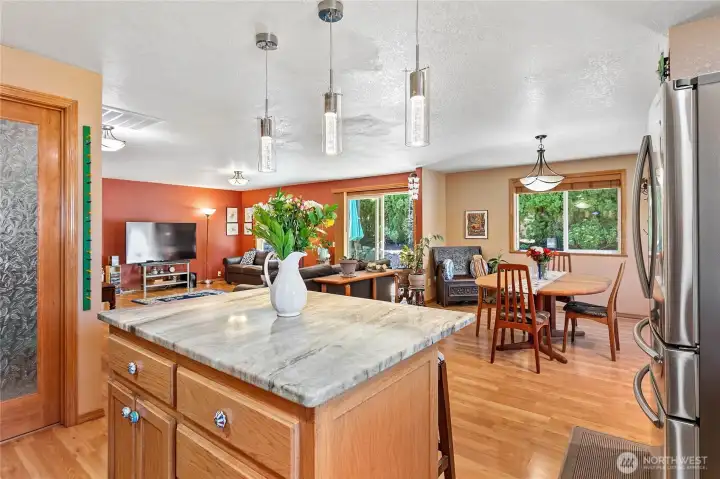 Stay connected while you cook with ample viewing lines from the kitchen into the open-concept living and dining areas.