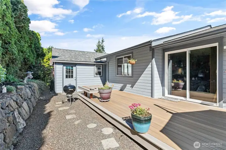 Stunning deck with seamless flow into the open-concept dining and living areas, perfect for indoor-outdoor entertaining.