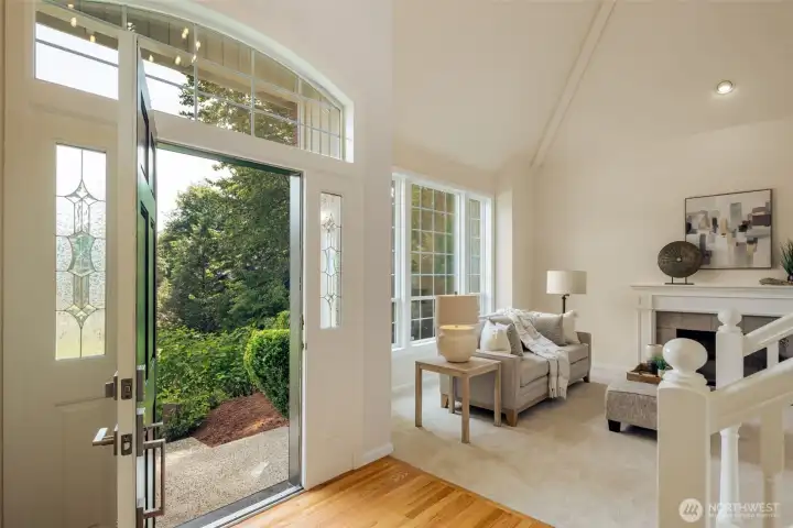 Step inside.  The 2-story entry adjacent to the living room.