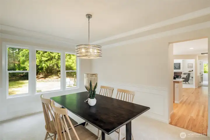 Spacious dining room with entry to the kitchen.