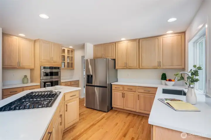 This is a wow kitchen...featuring gas cooktop, undmount farm sink, double oven, lots of cabinet and counter space.  Perfect for entertaining friends and family.
