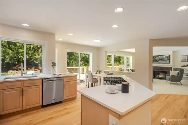 View from the kitchen to the eating space and family room...you're always part of the action!