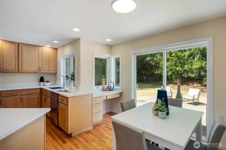 Kitchen features slider to the truly entertainment sized deck and patio.
