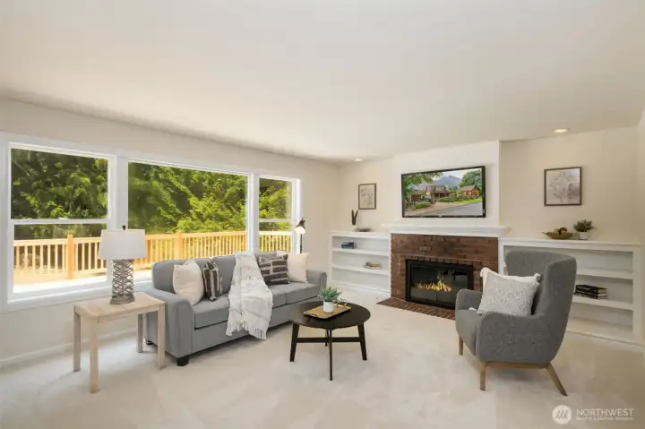 Family room off the kitchen with great view of the deck and backyard.
