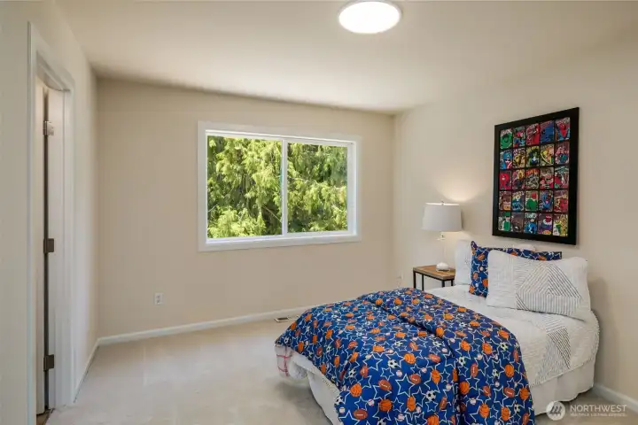 Guestroom 2 is also very spacious and overlooks the backyard.