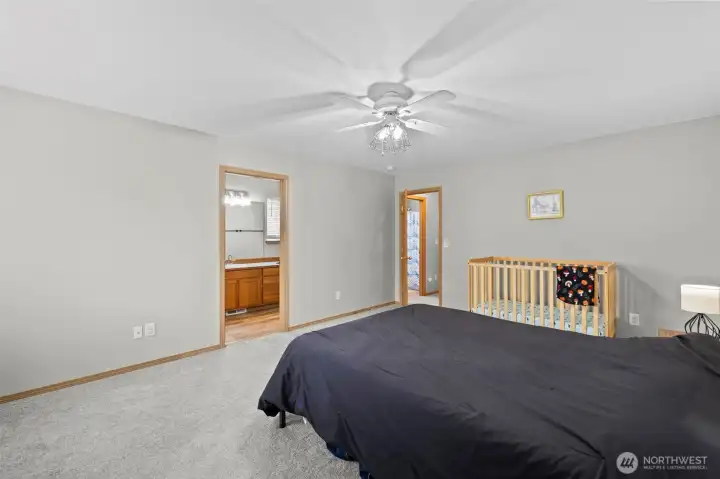 Primary suite with a private ensuite bath and walk-in closet.