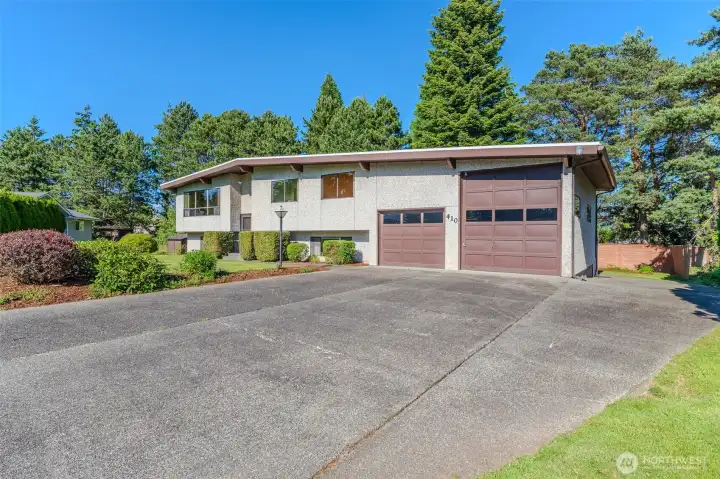 Oversized 2-car garage with room to park a boat or RV.