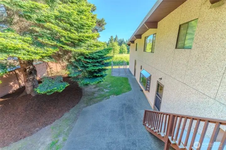 Stairs off deck to lower level patio.