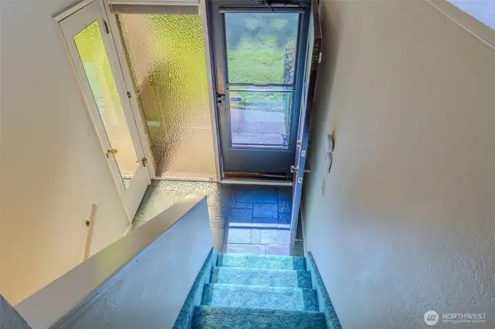 Split-level home - Now we're going to the lower level with 4th bedroom, family room, laundry room, utility room and craft space.