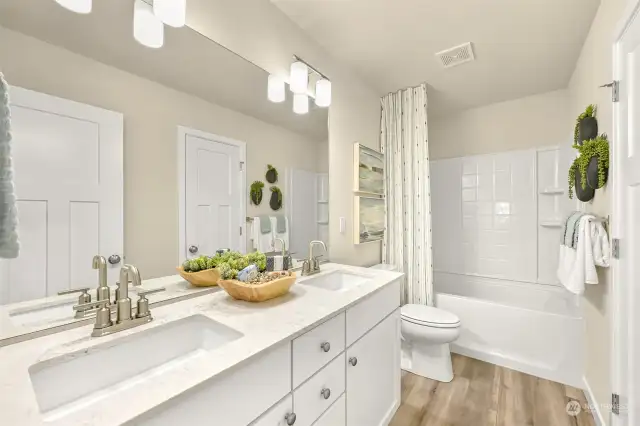 Full upper level bathroom with double sinks