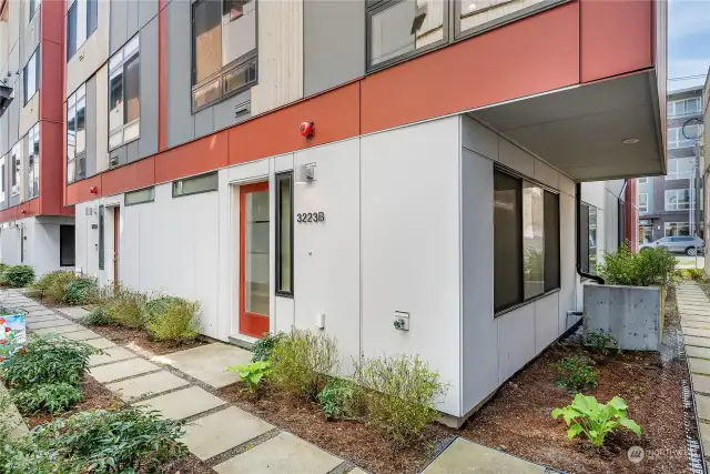 South-facing, end unit home with two access walk-ways.  Parking is only a few steps away