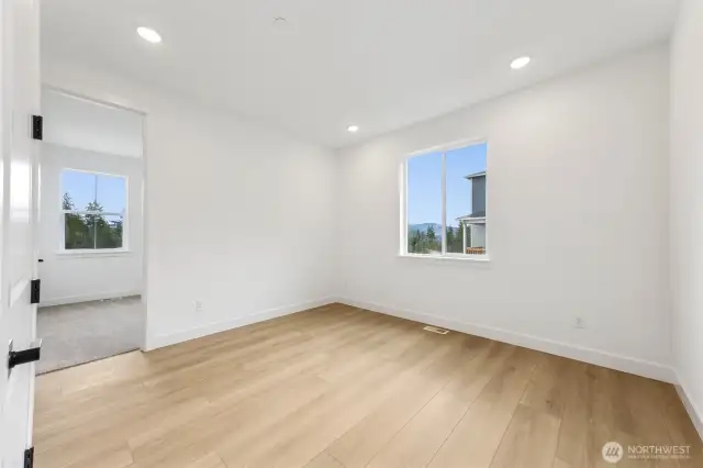 Private living room with separate laundry.
