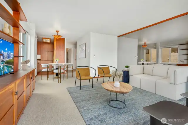 Virtual staging looking toward kitchen and entry