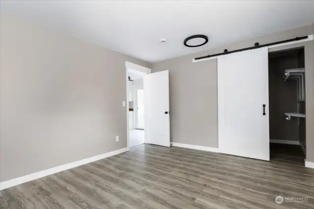 Primary bedroom with a walk in closet!