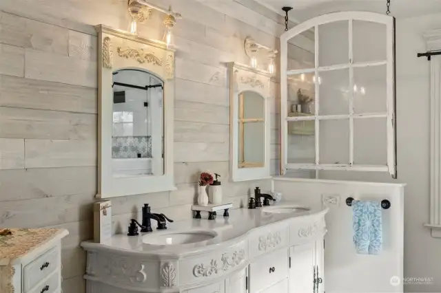 Farmhouse chic double vanity located off of the primary bedroom.