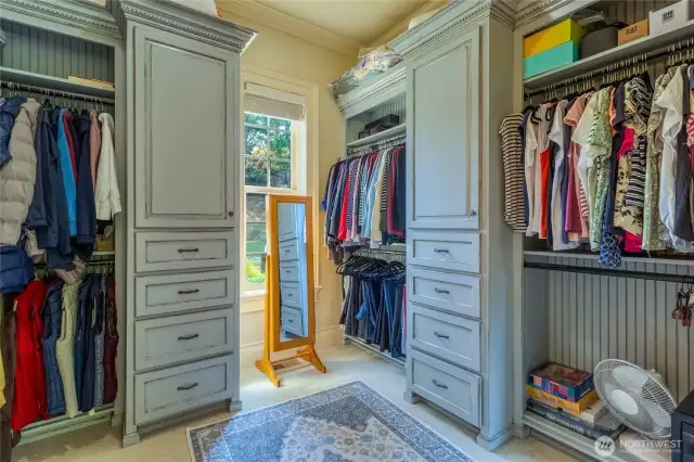 Spacious walk-in closet with built-in storage