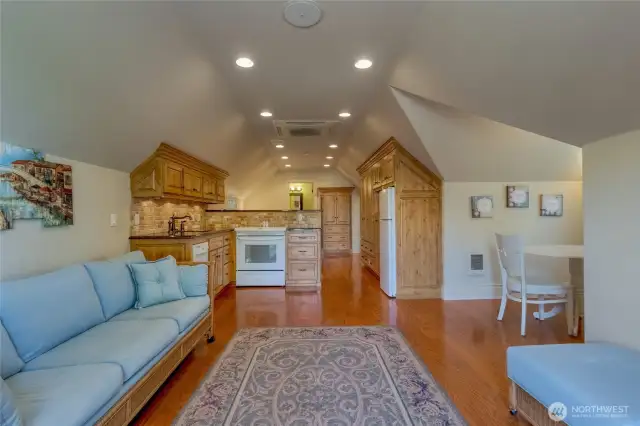 433 sq ft. ADU located above the garage equipped with a kitchen, and dining area