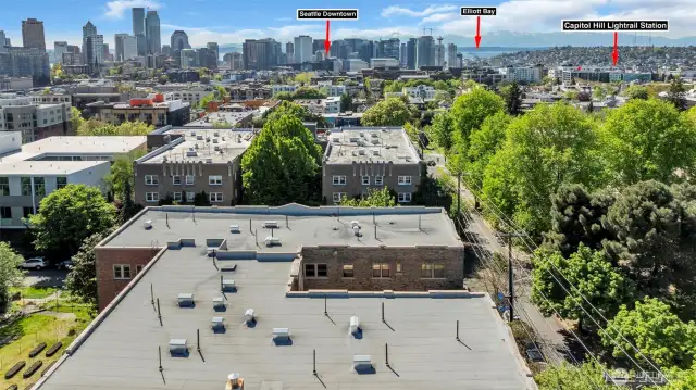 Drone from above the roof. Close to the Capitol Hill Light Rail Station, downtown Seattle, and Elliott Bay. Walk Score 98! Excellent Transit! Very Bikeable!