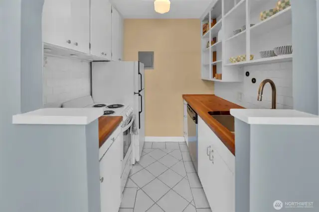 View through archway into kitchen