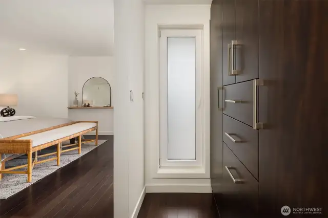 Primary bedroom built in closet