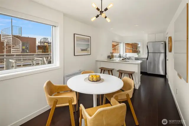 Dining room with kitchen beyond