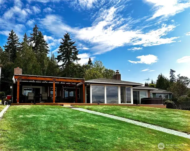 Full view of the back of the house and pergola as seen from your private dock.
