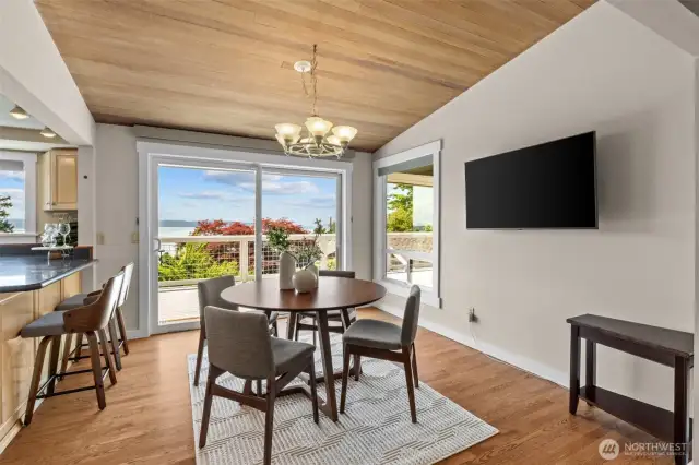 The dining room with newly installed clear sliders (extra wide) and yes TV conveys with sale