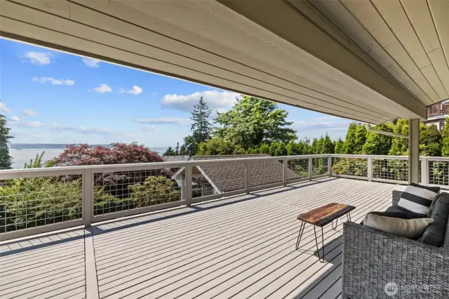 Expansive wraparound deck offers panoramic views and endless space for relaxation or entertaining.  Plus a nice covered area