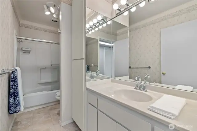 Spacious full bathroom designed for ease and functionality.