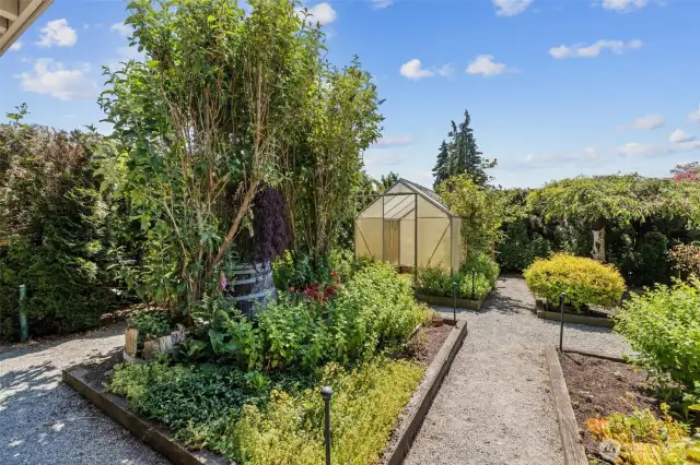 Beautiful backyard garden and peaceful sanctuary complete with a handy garden shed for all your tools and storage needs.