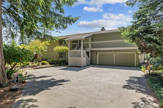As you arrive, enjoy the incredible driveway and ample parking space—plus a convenient RV hookup.