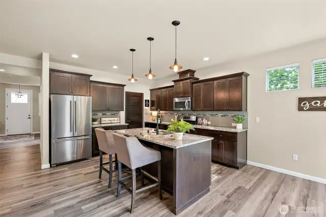 open concept living downstairs with two oversized, massive sliding doors